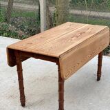 Louis Philippe 19th century square table with shutters in solid oak wood on casters