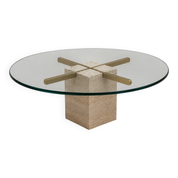 Vintage round coffee table with thick glass top and travertine and brass base
