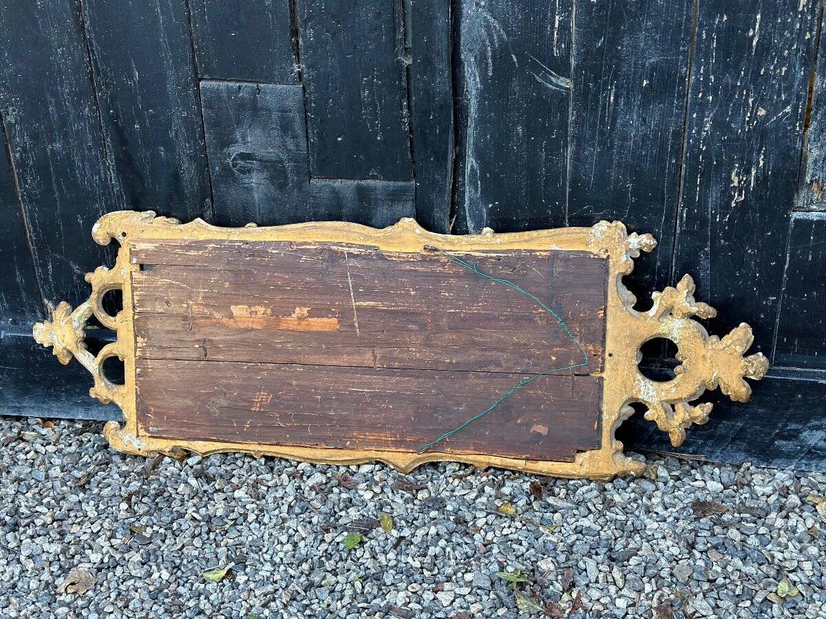 Carved and gilded wooden mirror, late 18th century