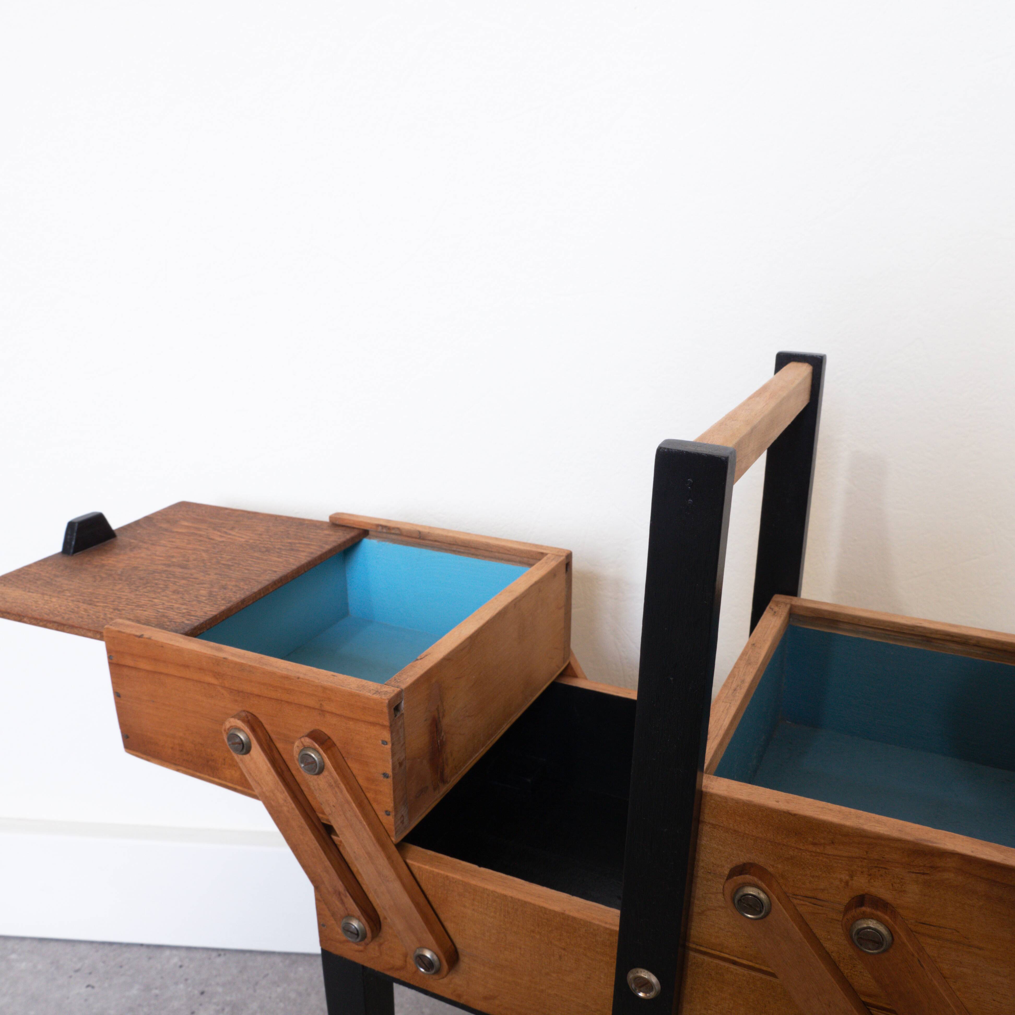 Old wood worker, black feet, blue interior