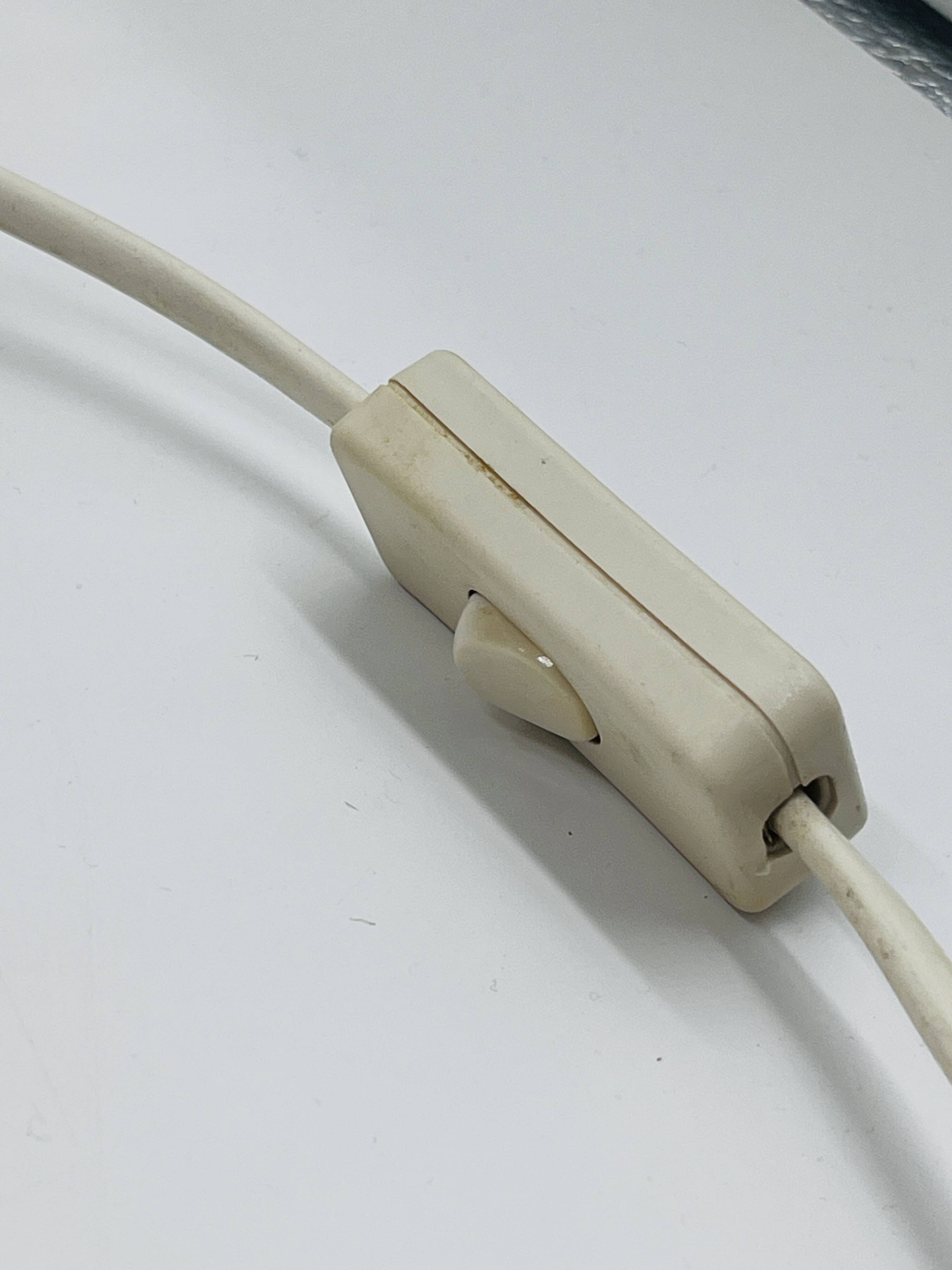 Vintage ceramic lamp with relief and wool shade.