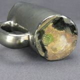 Old Biot, modernist pitcher in iridescent black ceramic.