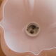 Applied art deco in white porcelain and pink opaline globe