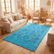 Tapis berbère bleu turquoise motifs multicolores