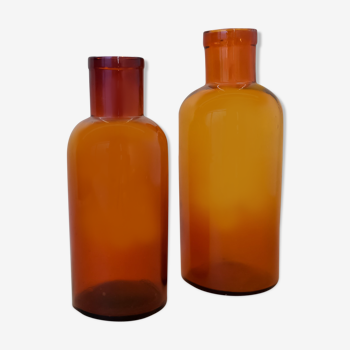 2 Old bottles of amber glass pharmacy in the early 20th century
