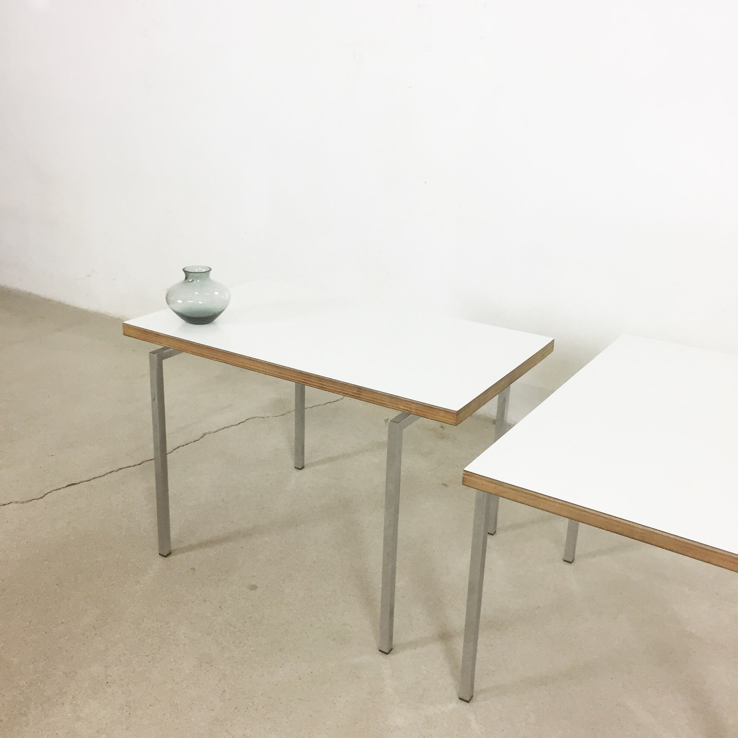 Lot of 2 modernist stackable tables by Trix & Robert Haussmann of 1957