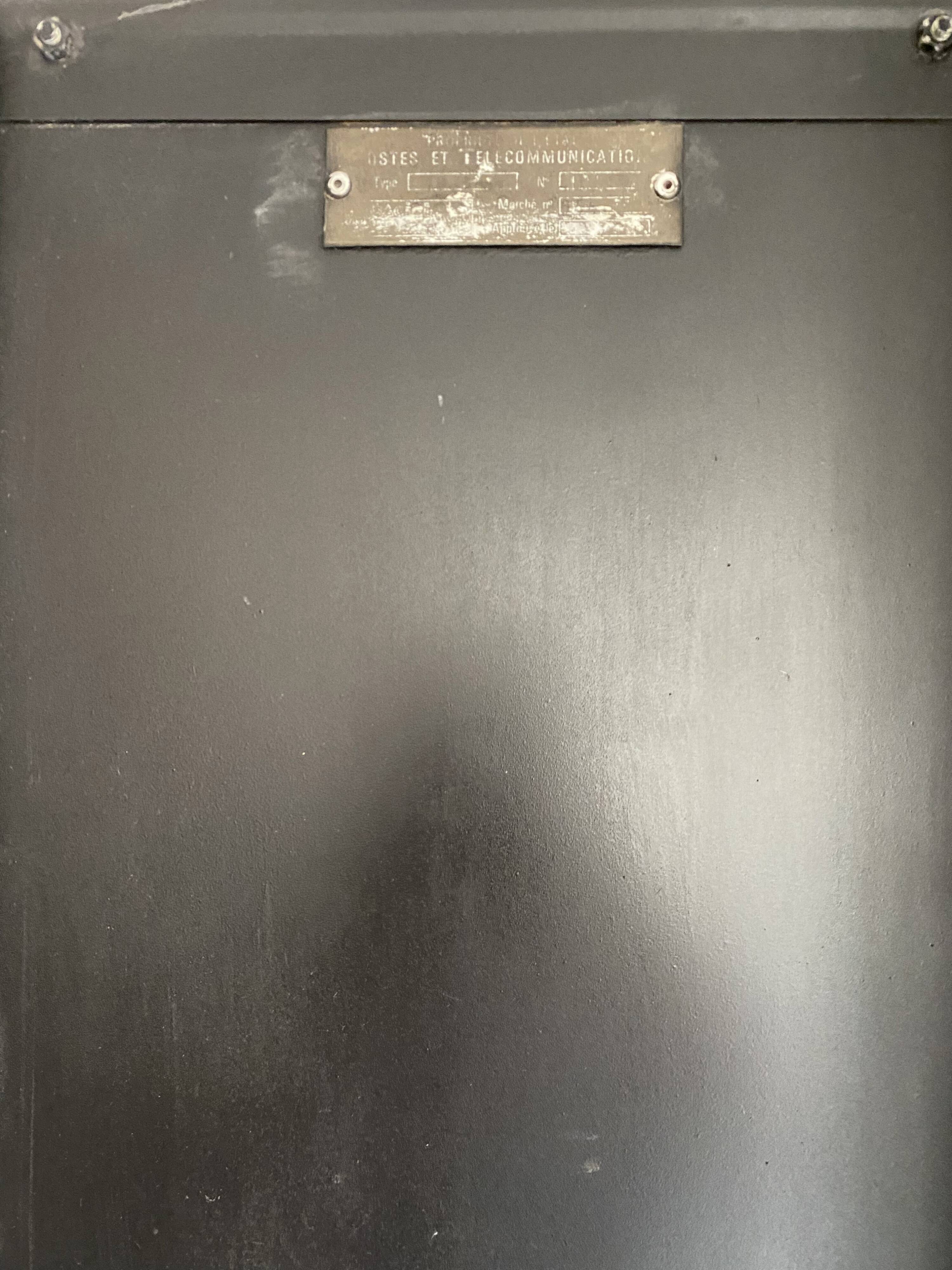 Postal sorting desk with a sliding top part back and forth.