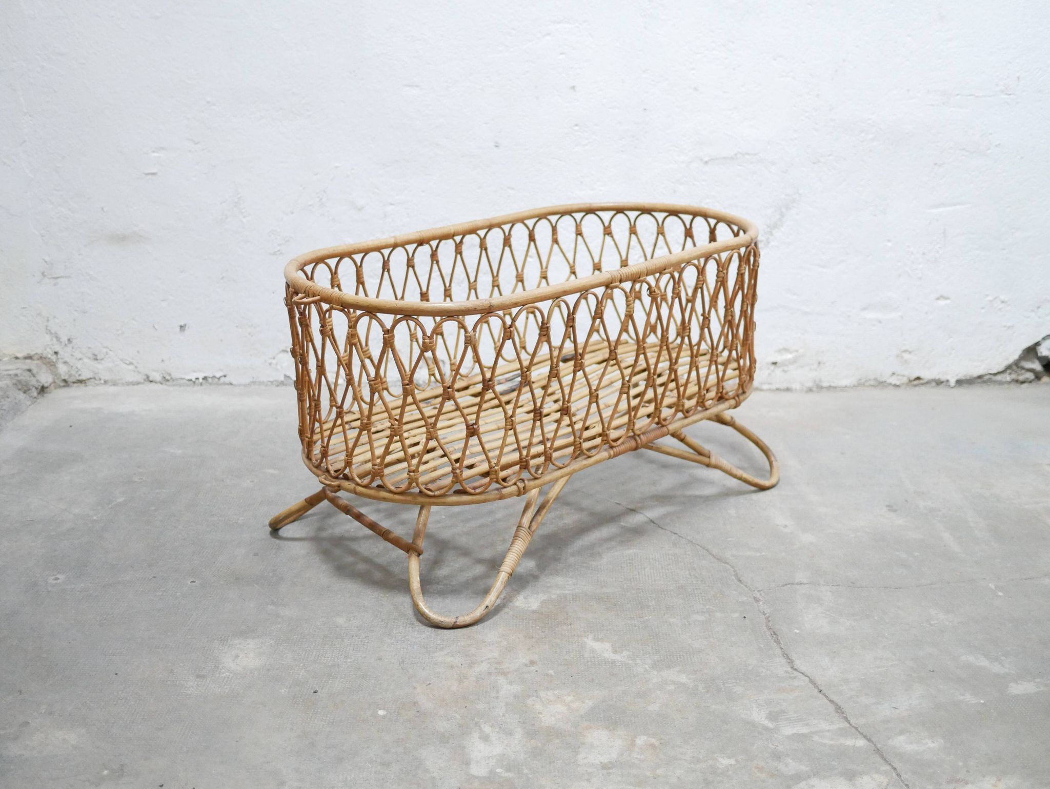 Vintage rattan cradle