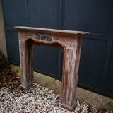 Patinated wooden fireplace