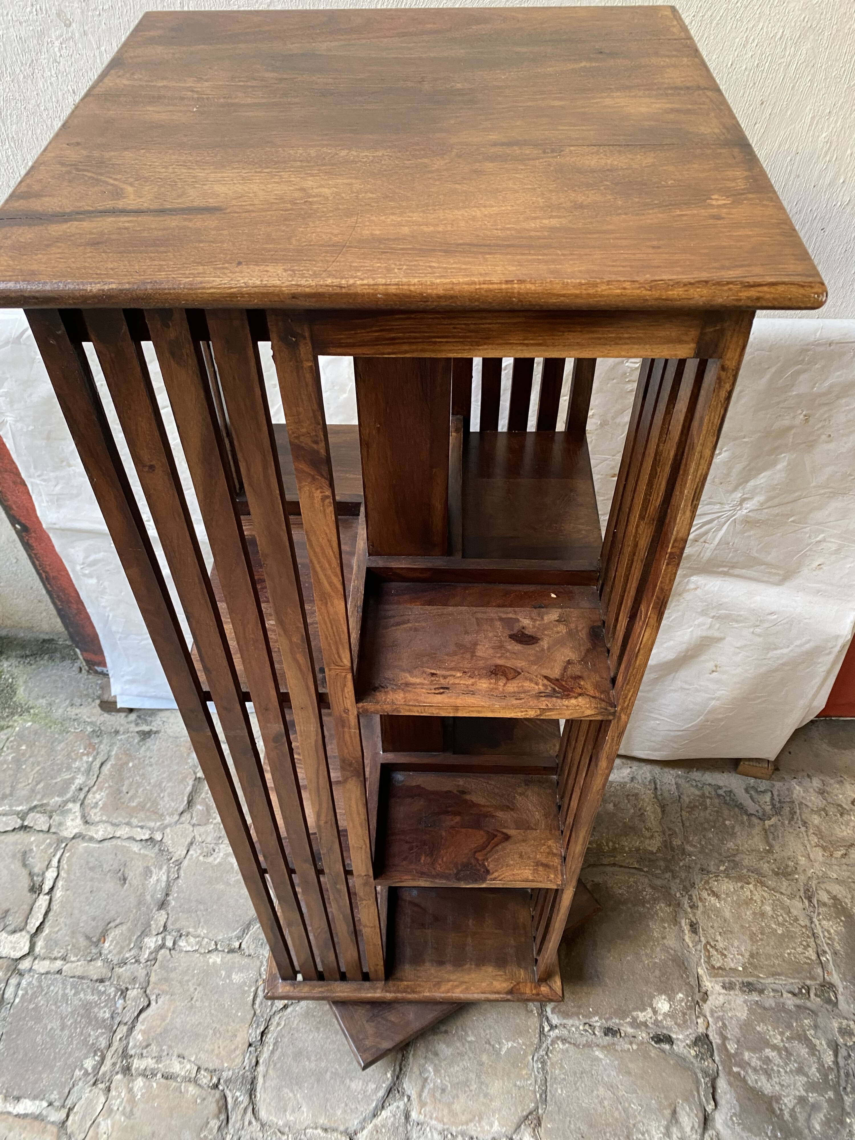 Pivoting column library in mahogany, 20th century.