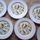 6 antique dessert plates with Toucan decor