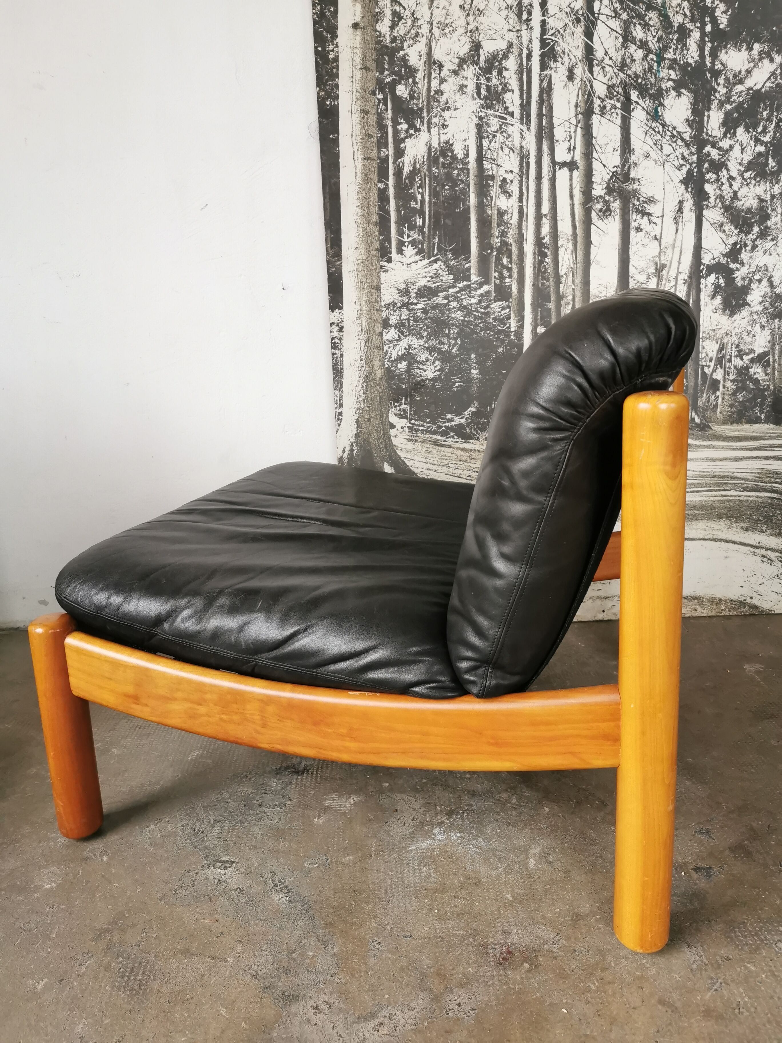Pair of designer leather armchairs 80s