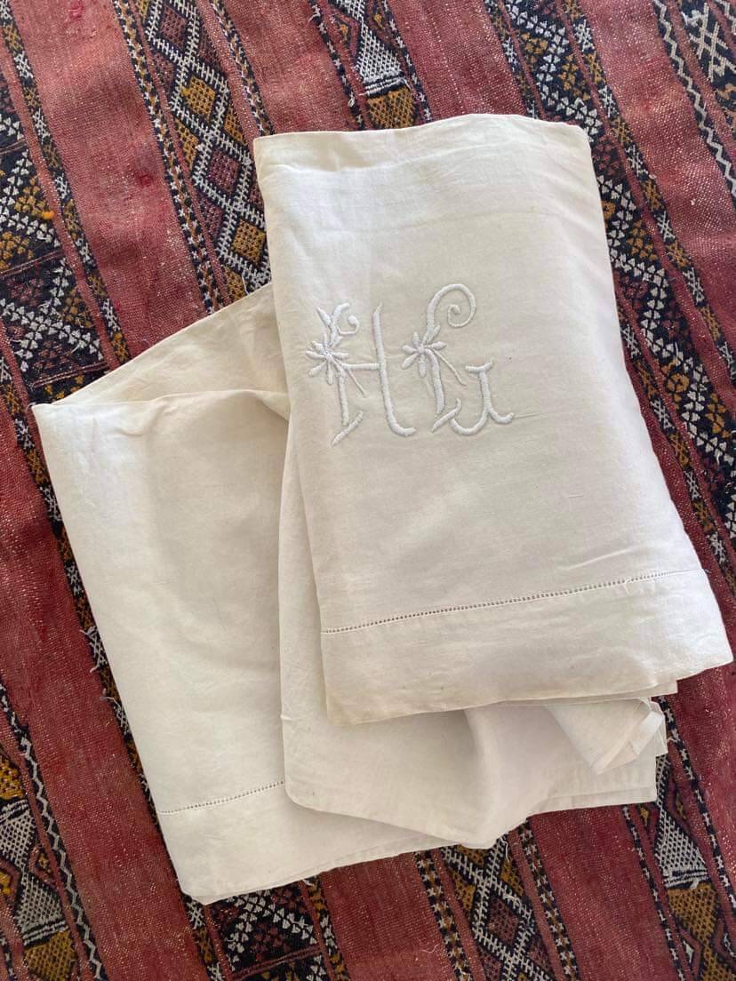 Drap en metis monogramme HG.