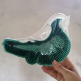 Empty green and white ceramic bird pocket
