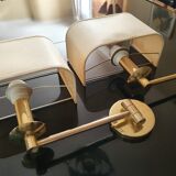 Pair of brass articulated wall sconces
