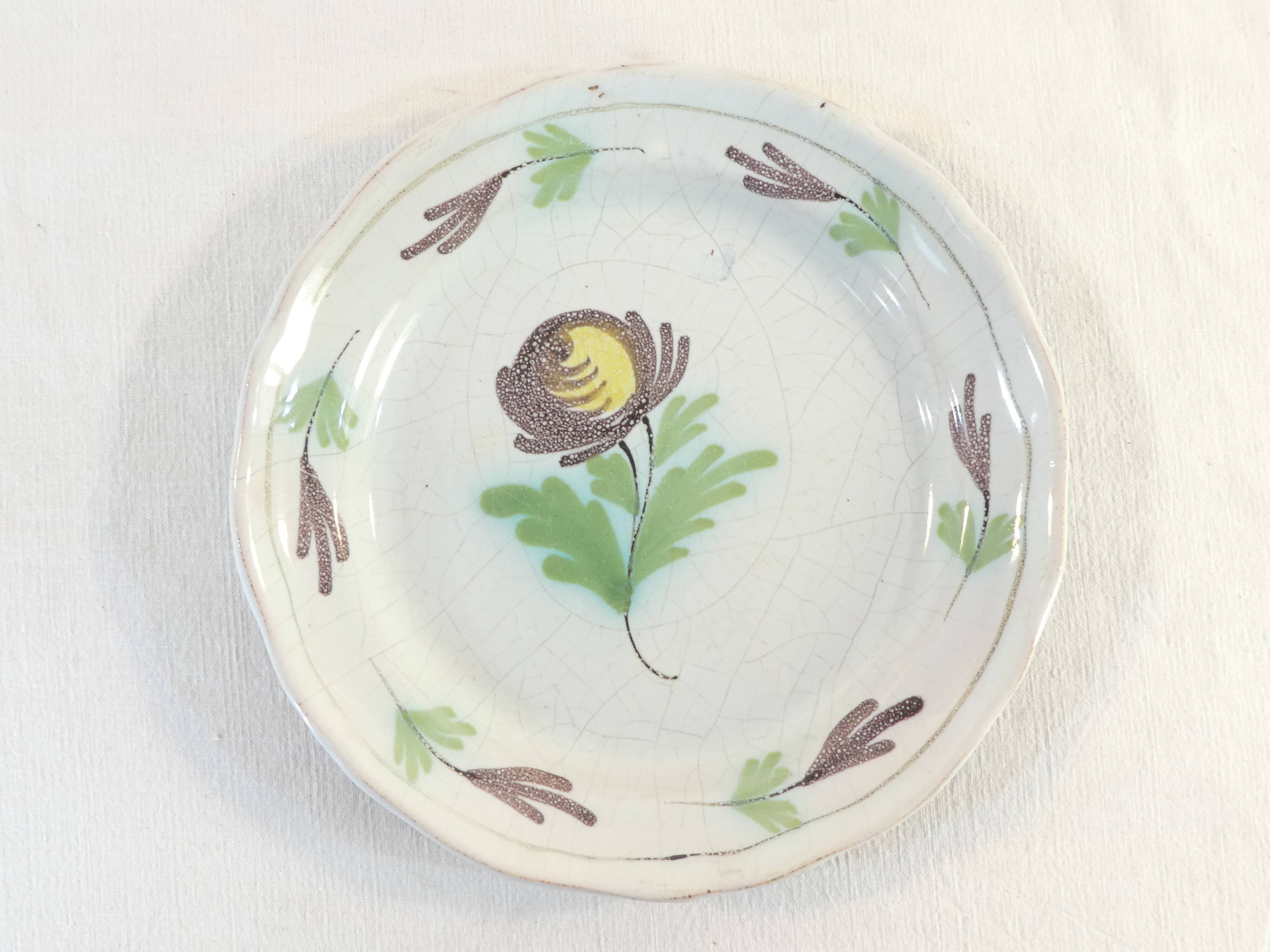 Plate cul noir 19 eme in faience of rouen de la metairie