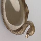 Metal swan emptier