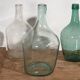 Antique colored demijohns (c.1920). Set of 3 pieces