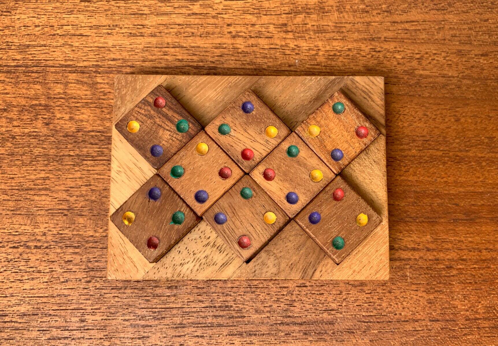 Mid-century Scandinavian teak dice game from the 1960s.