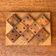 Mid-century Scandinavian teak dice game from the 1960s.