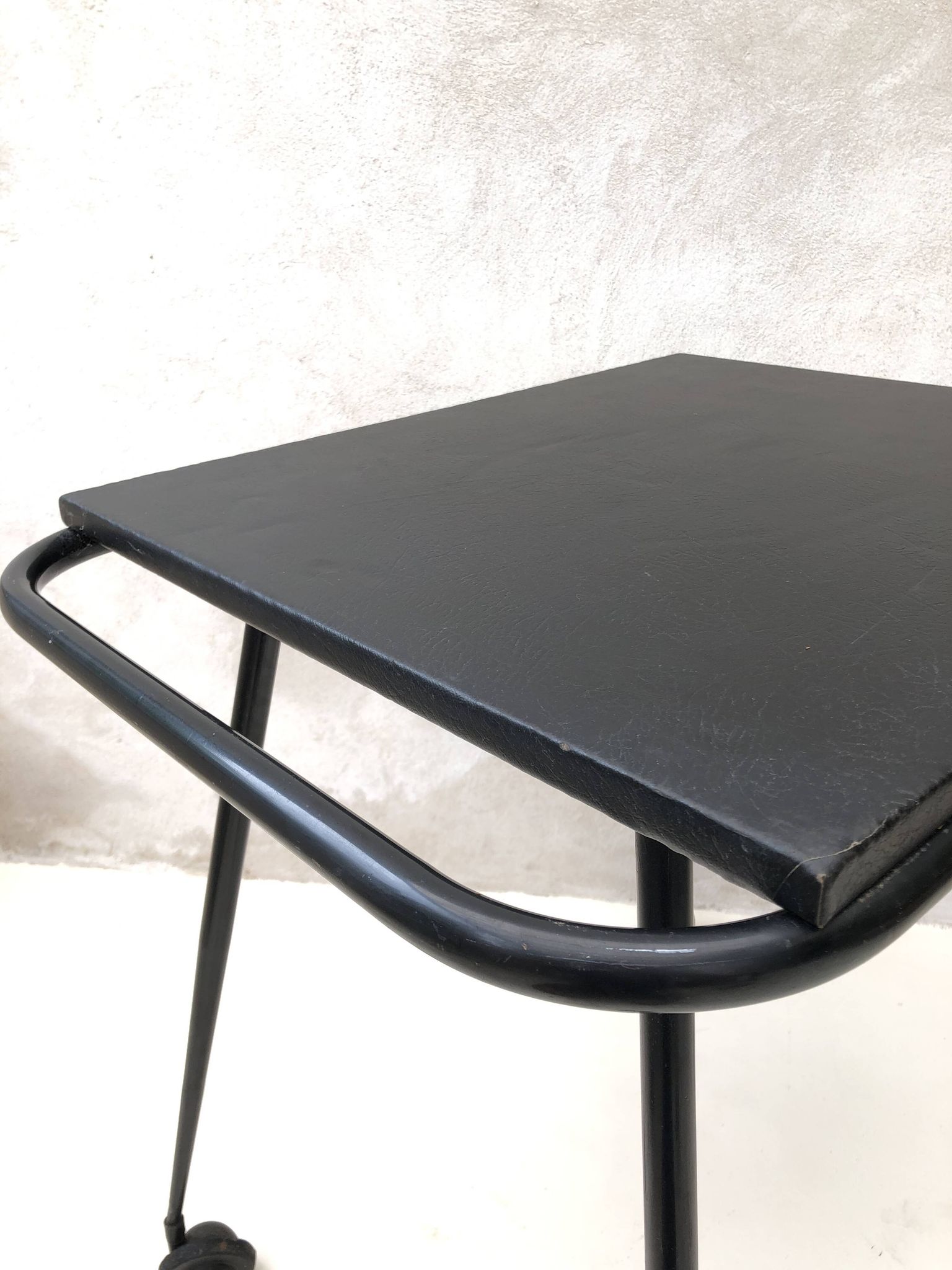 Black table on wheels from the 60s