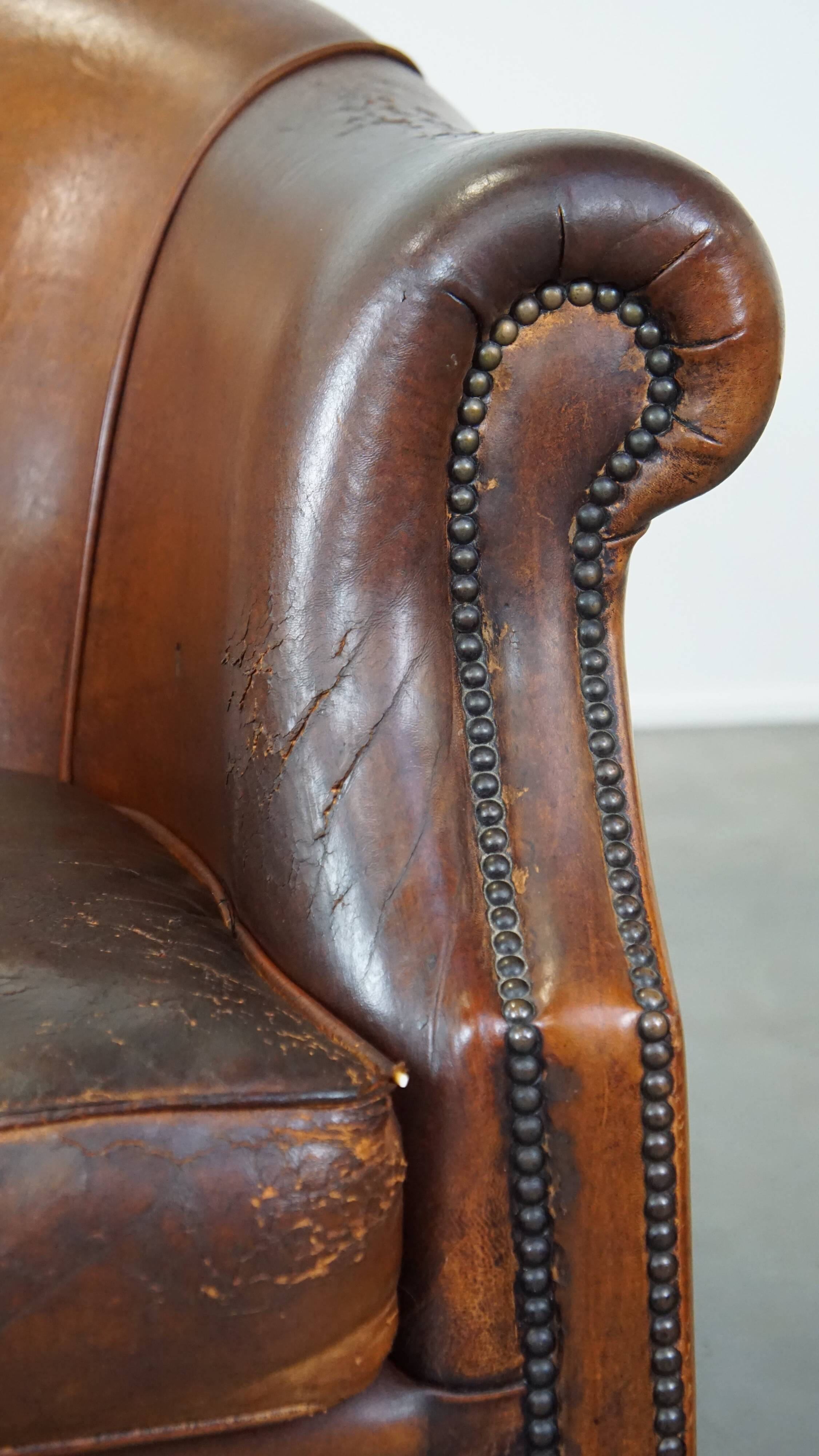 Vintage club armchair in sheepskin leather