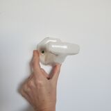 Trio of white porcelain hooks