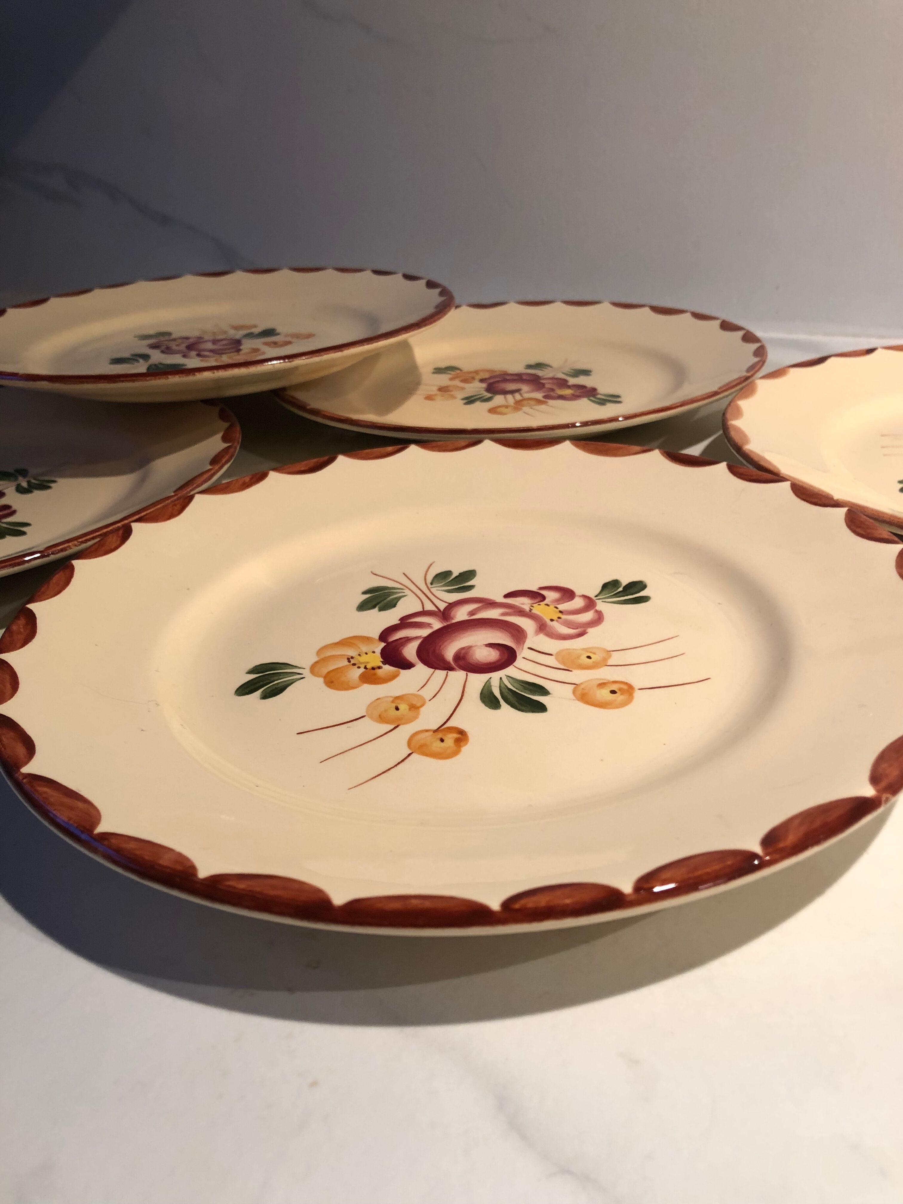 Six vintage Longchamp earthenware plates