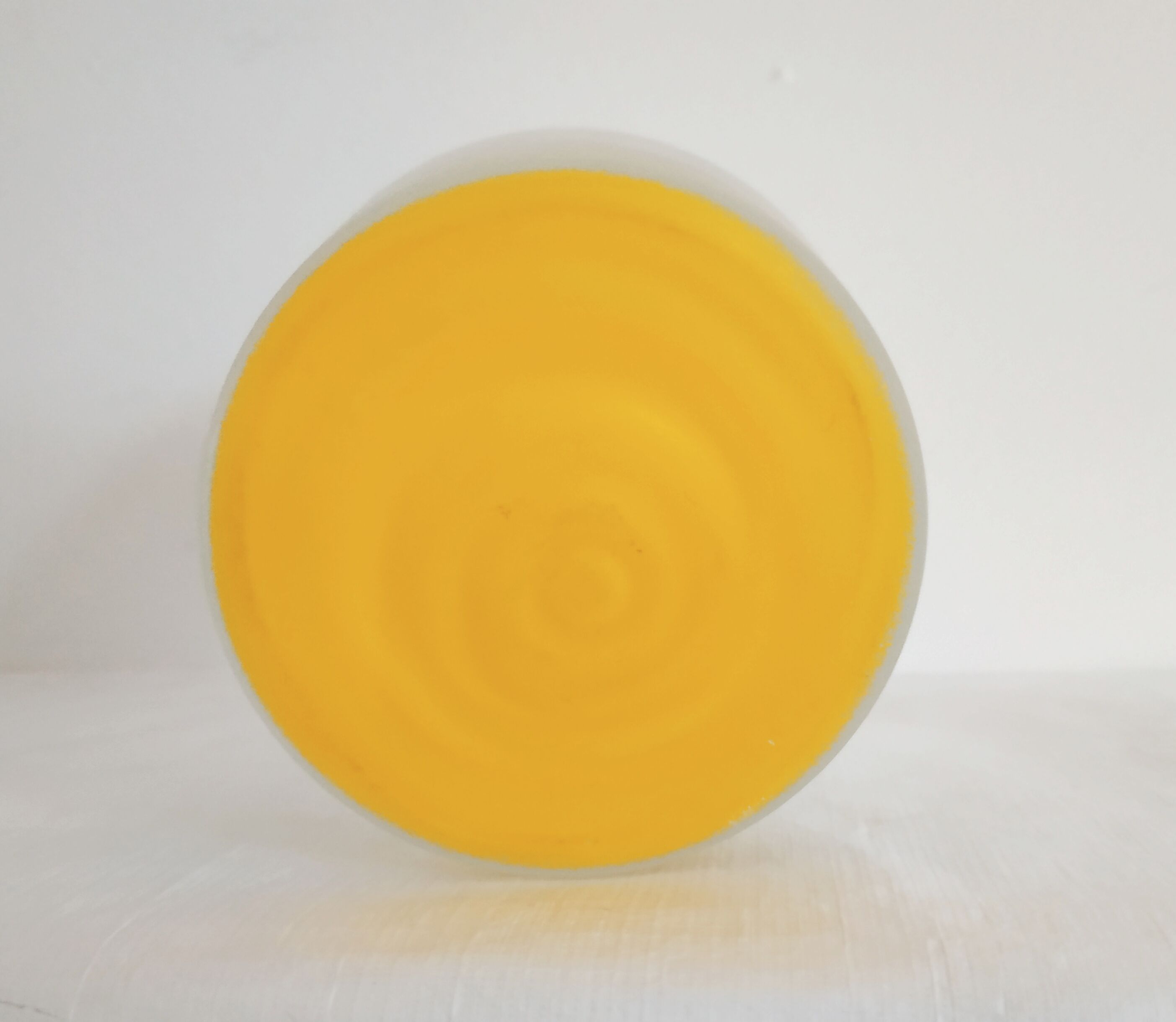 Frosted glass carafe with yellow bottom