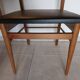 5 Scandinavian style chairs, wood and black faux leather.