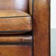 Art Deco design sheepskin leather armchair with a stunning patina