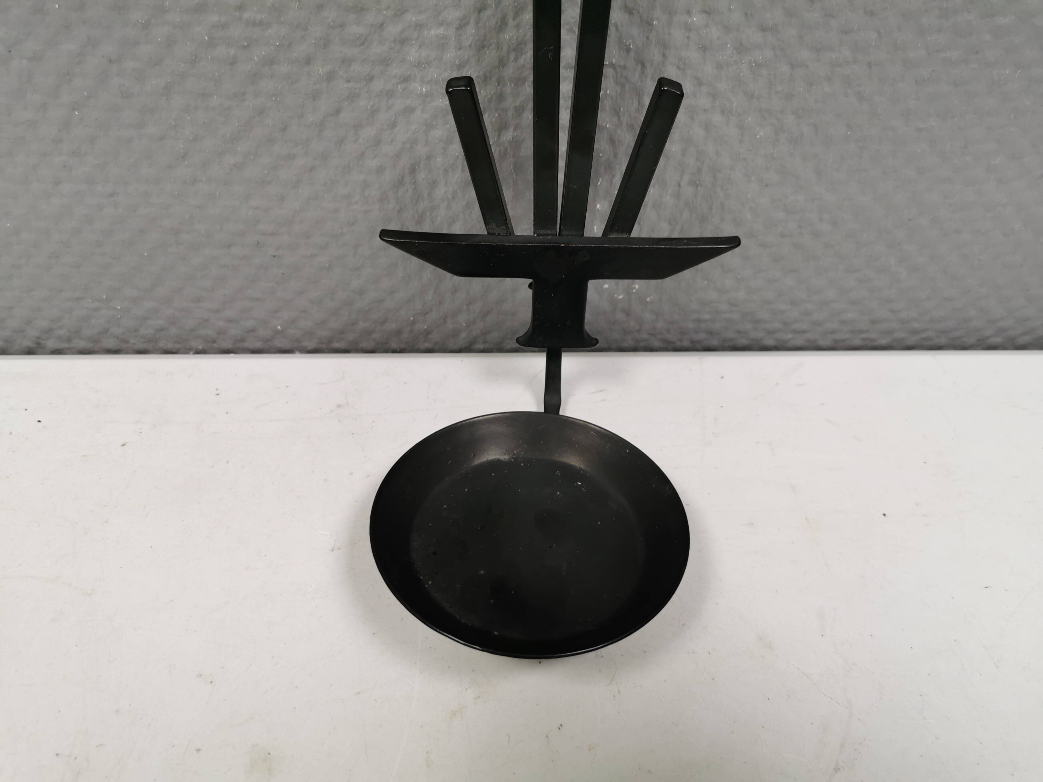 Vintage wall candle holder in wrought iron and hard pressed blue glass.