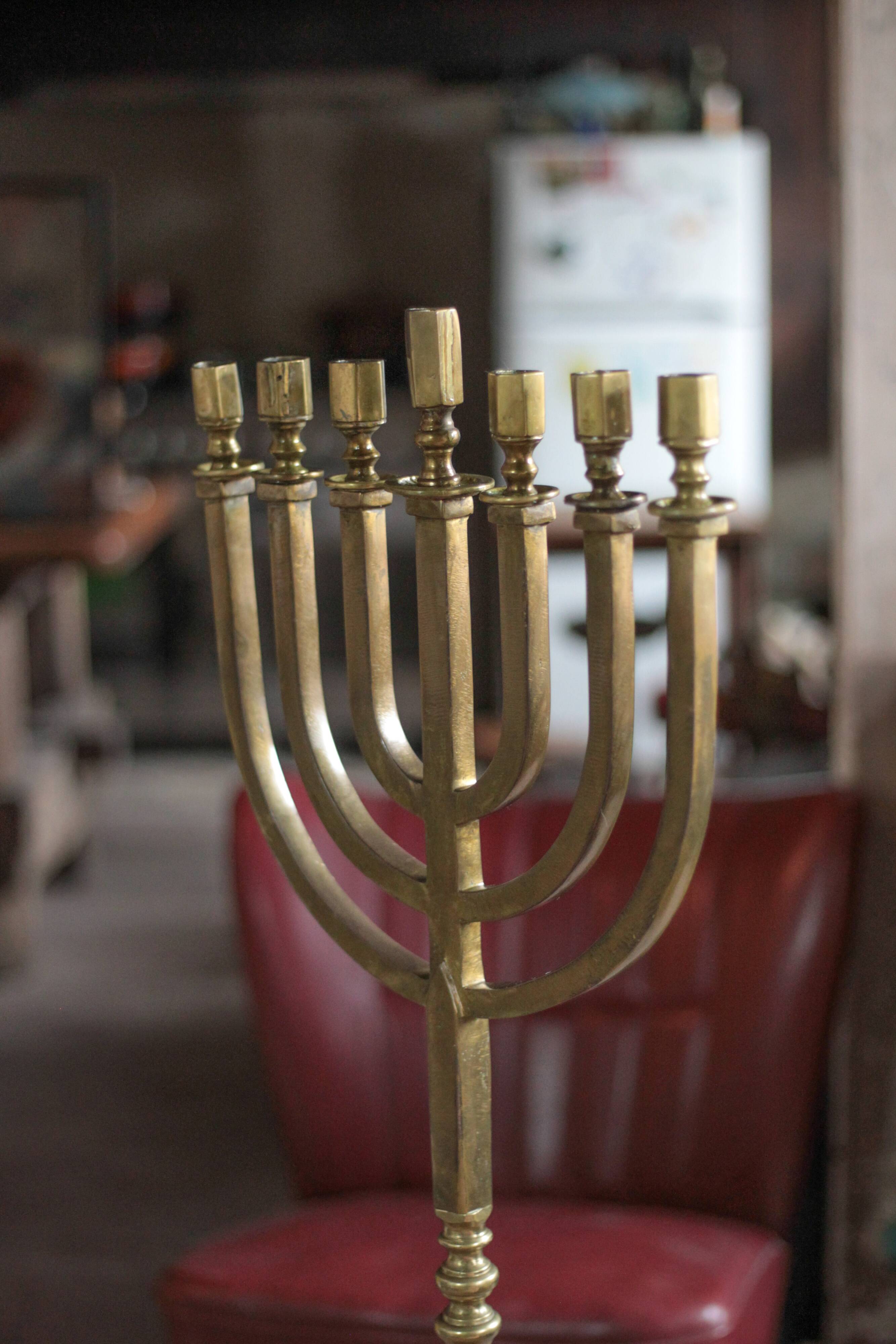 Golden bronze chandelier with seven arms, Menorah, candlestick on a stand, candelabrum.