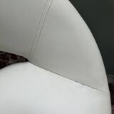 Pair of vintage white swivel armchairs in tulip style.