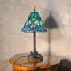 antique wrought iron floor lamp, 1900 to 1940 with stained glass lampshade