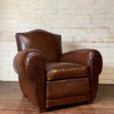 French leather club chair, chapeau de gendarme model, circa 1940