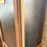 Vintage wooden wardrobe with matte cast iron color hanging rail