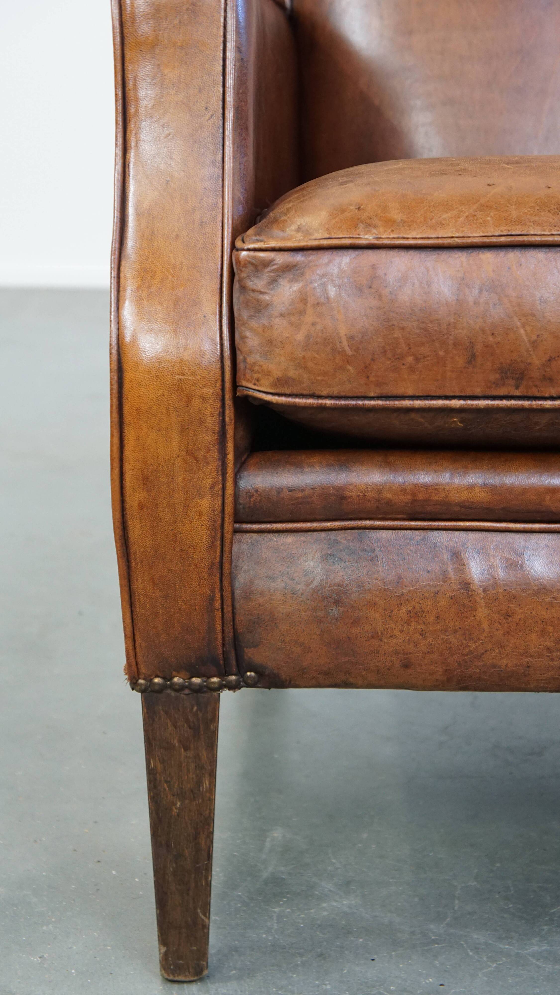 Sheepskin armchair with a refined Art Deco design