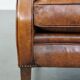 Sheepskin armchair with a refined Art Deco design