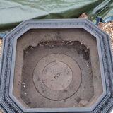 Black cast iron wood burning stove with solid brass handle.