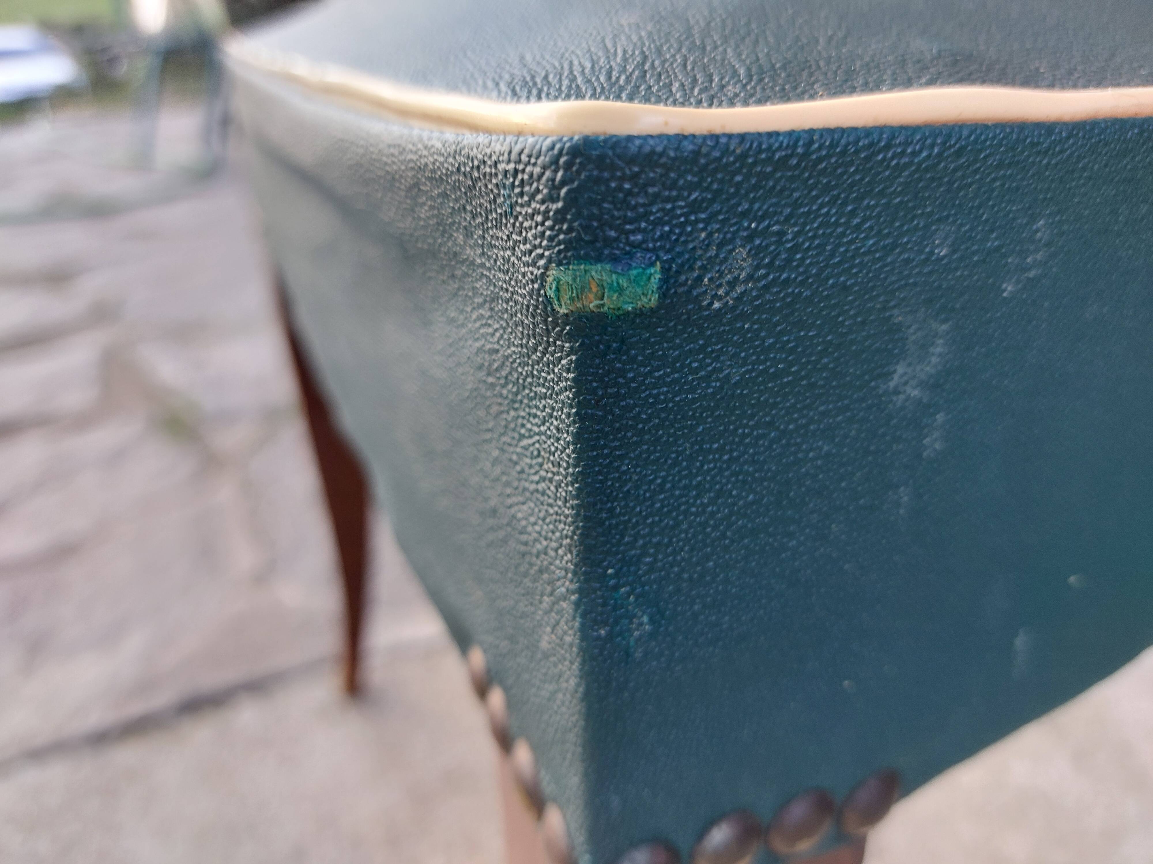 pair of dark green bridge armchairs