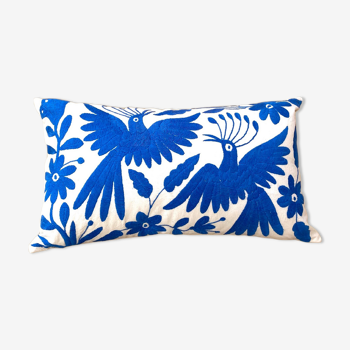 Blue embroidered cushion