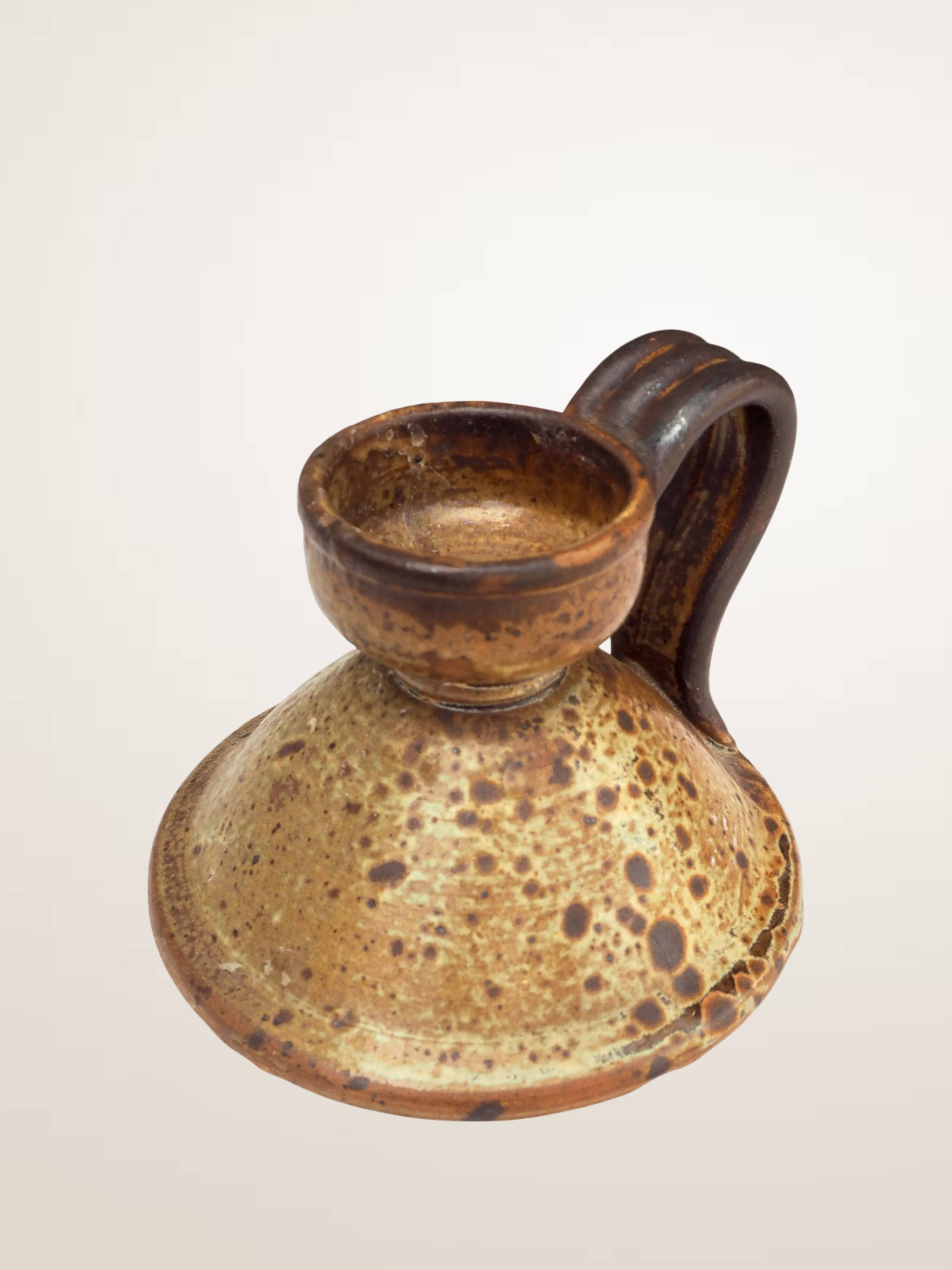 Handcrafted stoneware candle holder