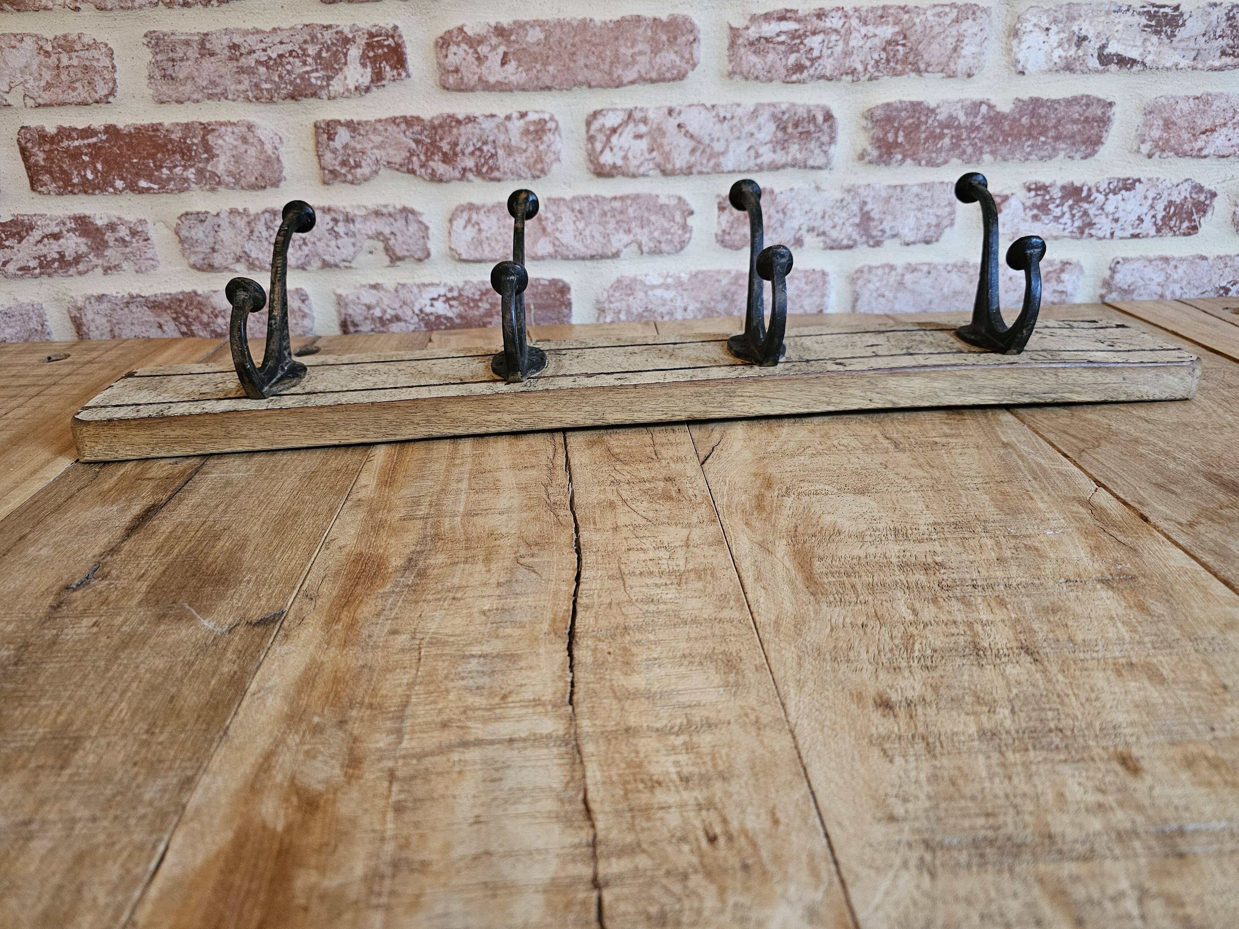 Solid teak coat hook with 4 double cast iron hooks