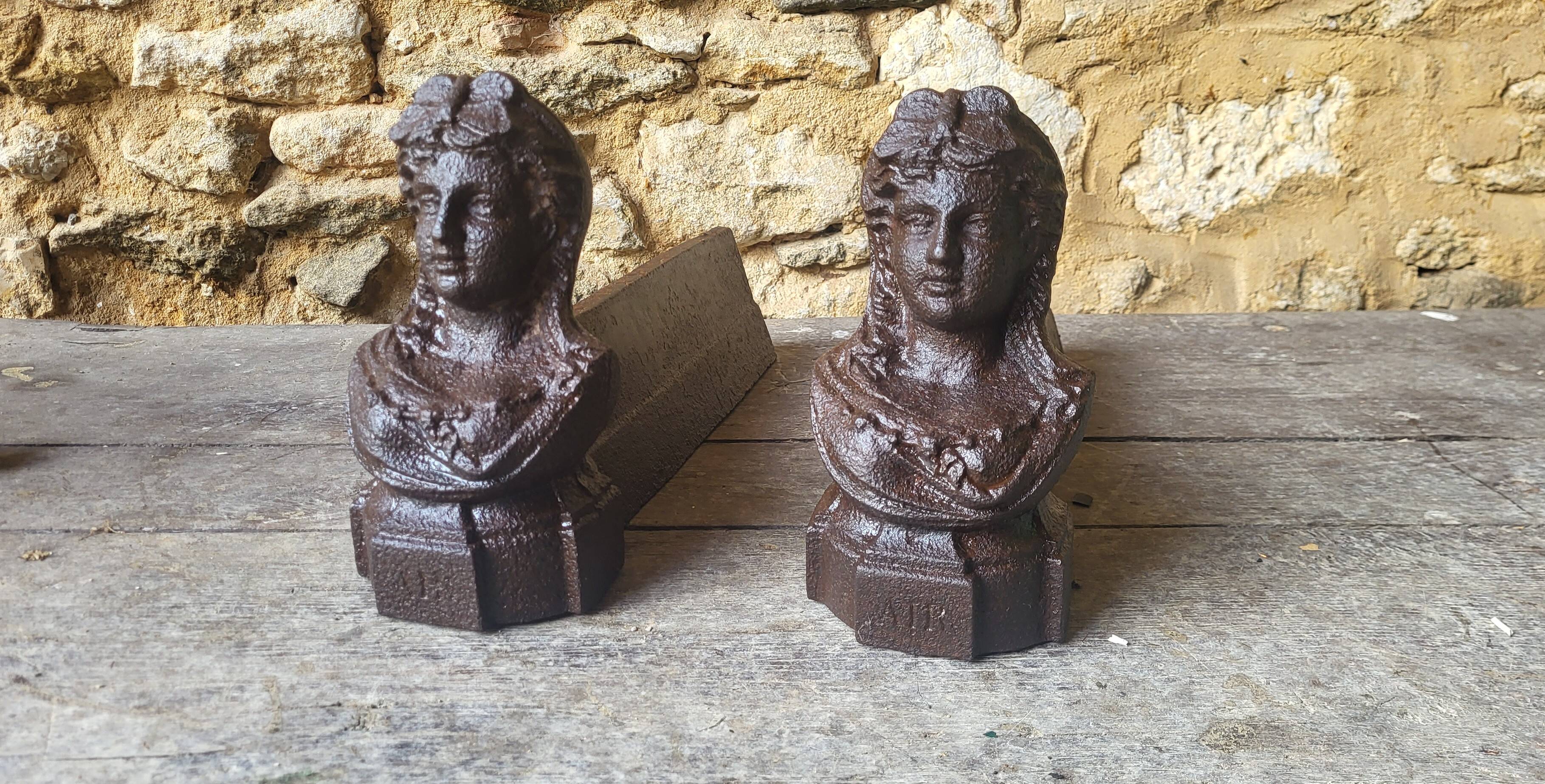 Paire de chenets en fonte XIXème