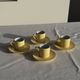 Set of 4 vintage yellow Italian espresso cups and saucers.