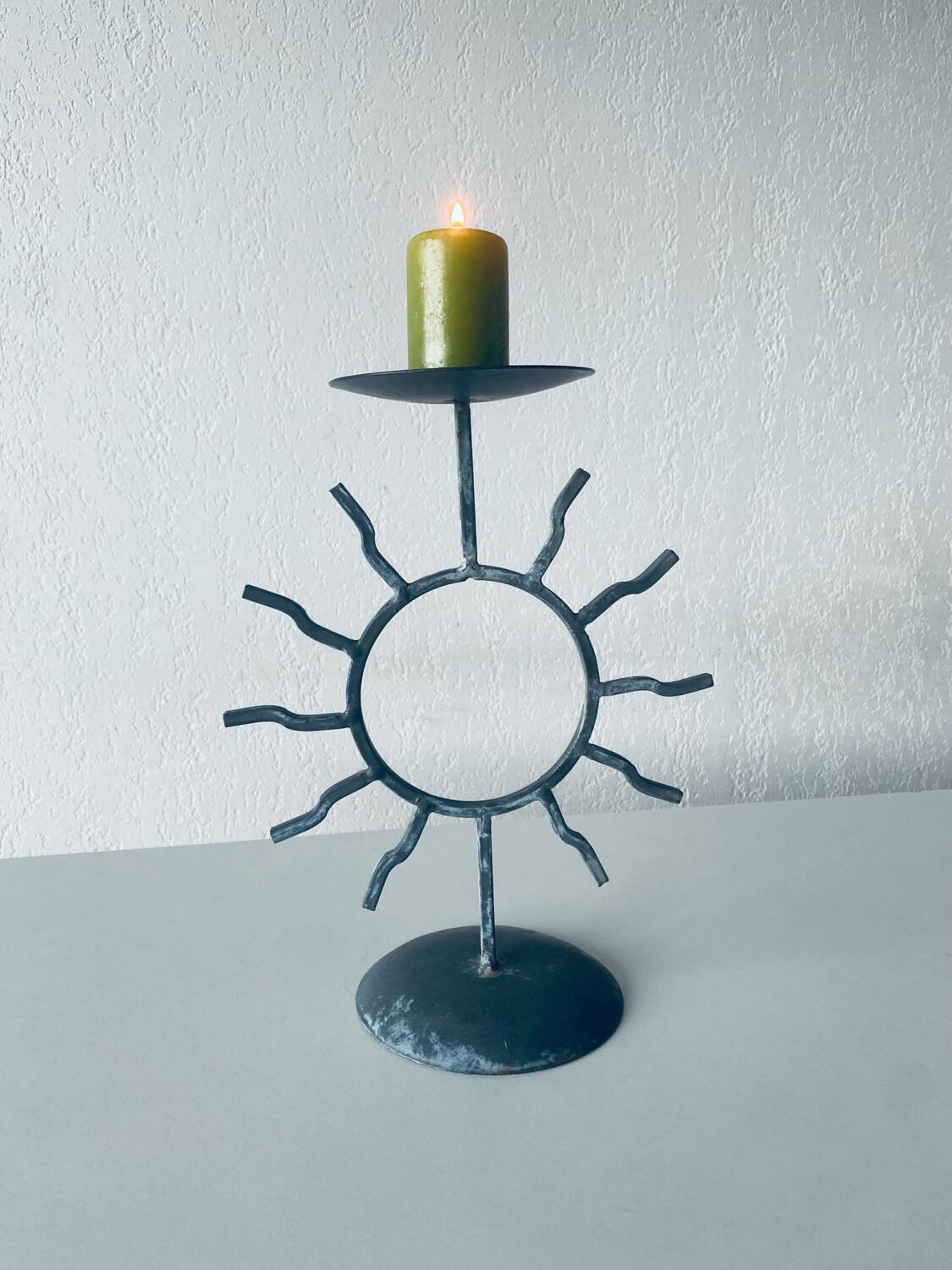 Iron sun candle holder