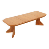 Large extendable Danish dining table in solid pine, 1970s.