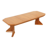 Large extendable Danish dining table in solid pine, 1970s.