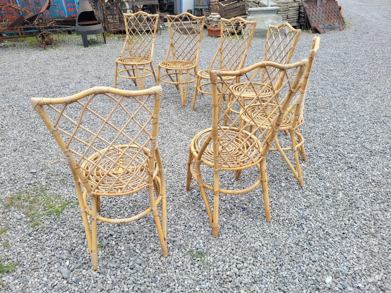 7 vintage rattan chairs